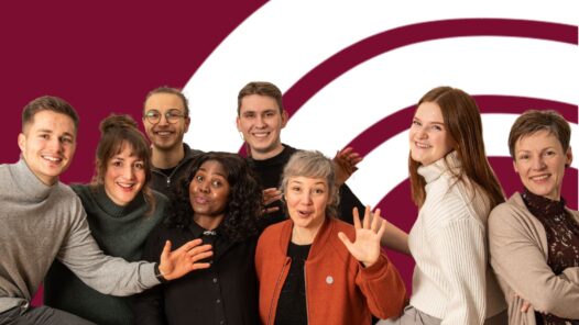 Das Coverbild der Podcast-Episode zeigt das Team des Utopia